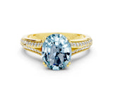 Yellow gold Oval Cut Aquamarine Split Shank Engagement Ring with Pavé Band