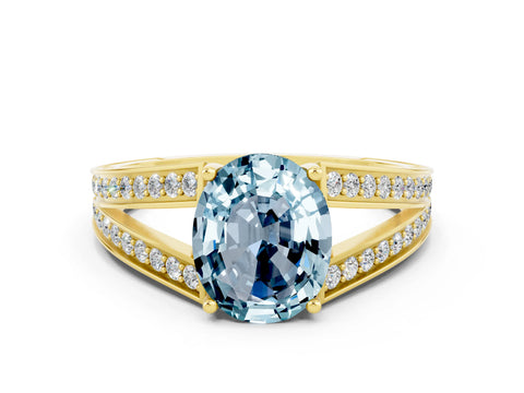 Yellow gold Oval Cut Aquamarine Split Shank Ring with Pavé Band and Four-Prong Setting