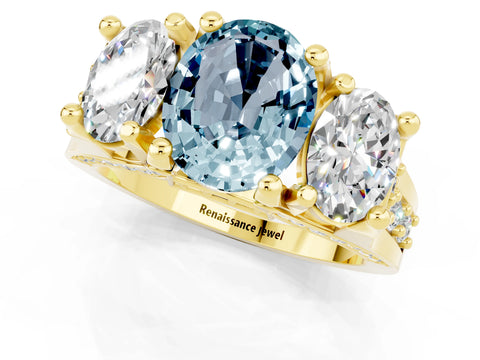 Yellow gold Oval Cut Aquamarine Three-Stone Ring with Channel Set Band and Four-Prong Setting_1