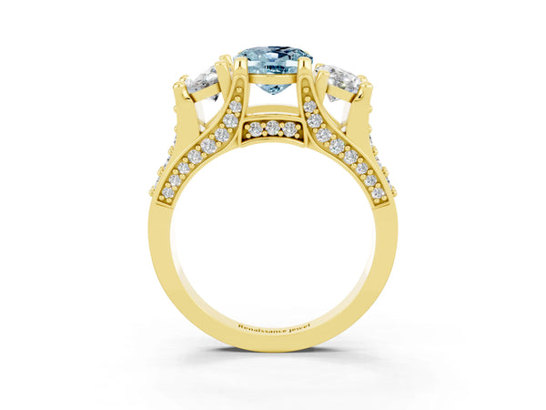 Yellow gold Oval Cut Aquamarine Three-Stone Ring with Channel Set Band and Four-Prong Setting