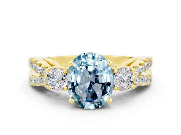 Yellow gold Oval Cut Aquamarine Three-Stone Ring with Pavé Split Shank and Four-Prong Setting