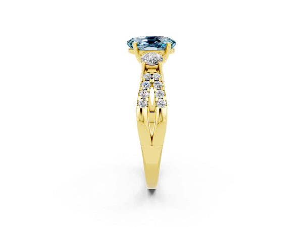 Yellow gold Oval Cut Aquamarine Three-Stone Ring with Pavé Split Shank and Four-Prong Setting