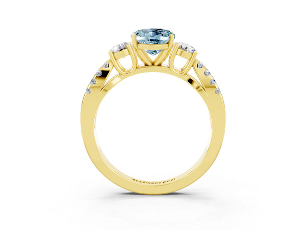 Yellow gold Oval Cut Aquamarine Three-Stone Ring with Pavé Split Shank and Four-Prong Setting