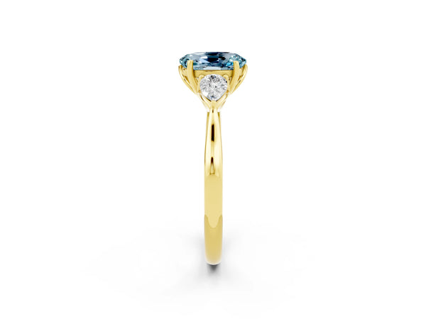 Yellow gold Oval Cut Aquamarine Three-Stone Ring with Pear  Side Stones and Prong Setting