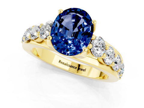 Yellow gold Oval Cut Blue Sapphire Engagement Ring with Pavé Band and Four-Prong Setting_1