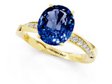 Yellow gold Oval Cut Blue Sapphire Engagement Ring with Side Stone Accents and Four-Prong Setting_28