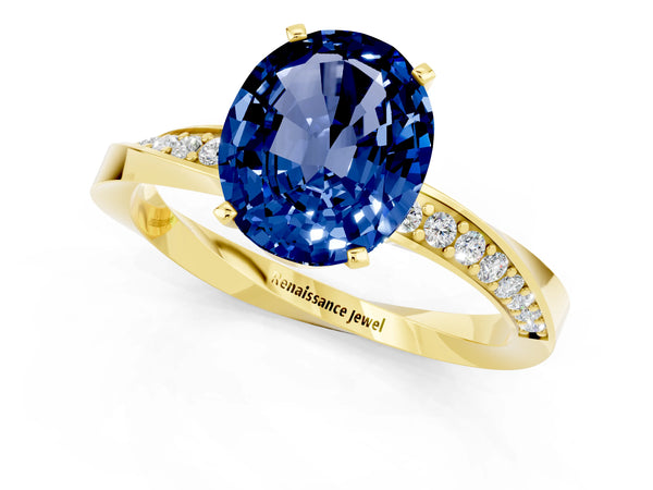 Yellow gold Oval Cut Blue Sapphire Engagement Ring with Side Stone Accents and Four-Prong Setting