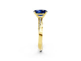 Yellow gold Oval Cut Blue Sapphire Engagement Ring with Side Stone Accents and Four-Prong Setting_62