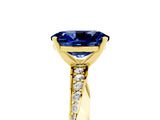 Yellow gold Oval Cut Blue Sapphire Engagement Ring with Side Stone Accents and Four-Prong Setting_65