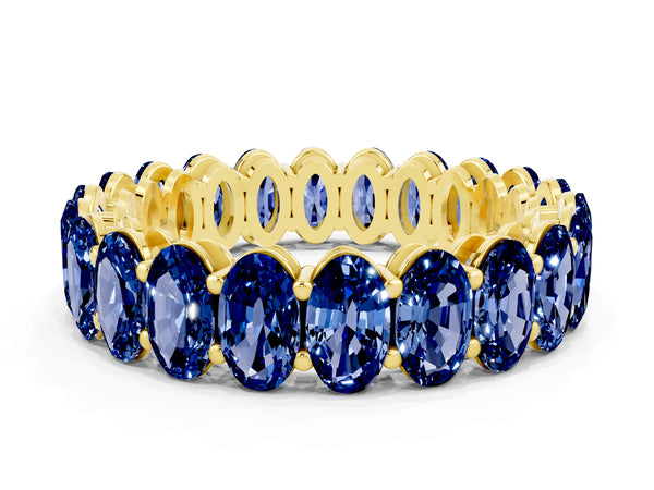 Yellow gold Oval Cut Blue Sapphire Eternity Band with Shared Prong Setting