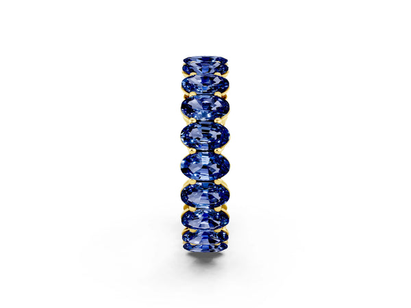Yellow gold Oval Cut Blue Sapphire Eternity Band with Shared Prong Setting