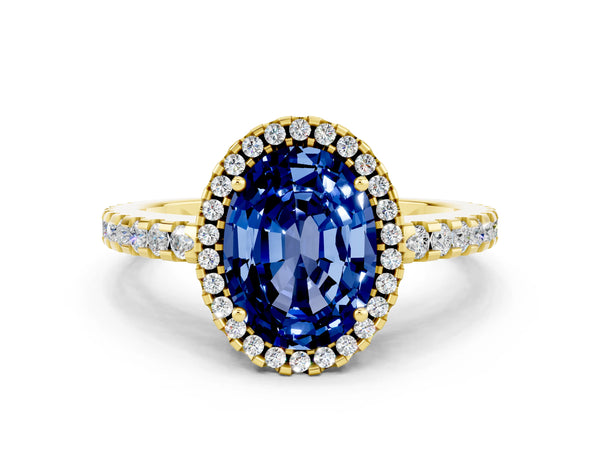 Yellow gold Oval Cut Blue Sapphire Halo Engagement Ring with Pavé Band and Prong Setting