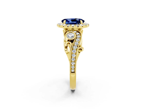 Yellow gold Oval Cut Blue Sapphire Halo Ring with Milgrain Pavé Band and Four-Prong Setting
