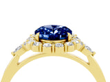 10K Yellow Gold Blue Sapphire Halo Ring with Pear Side Stones and Prong Setting