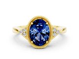 Yellow gold Oval Cut Blue Sapphire Halo Ring with Tapered Band and Four-Prong Setting_18