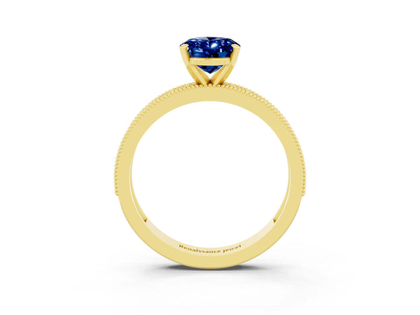 Yellow gold Oval Cut Blue Sapphire Milgrain Pavé Engagement Ring with Four-Prong Setting