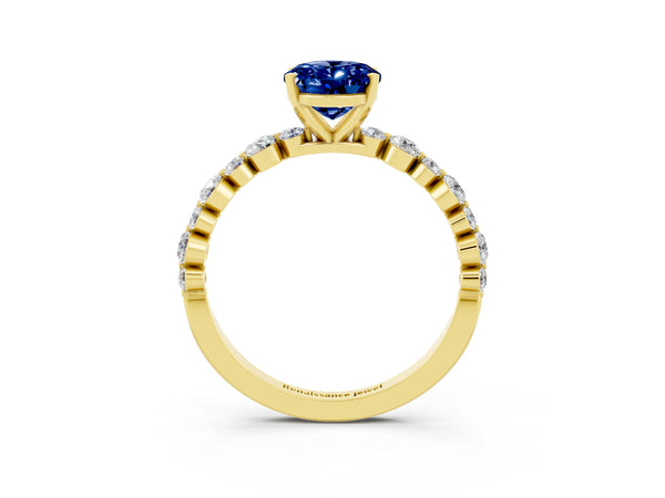 Yellow gold Oval Cut Blue Sapphire Prong Set Engagement Ring with Pavé Band
