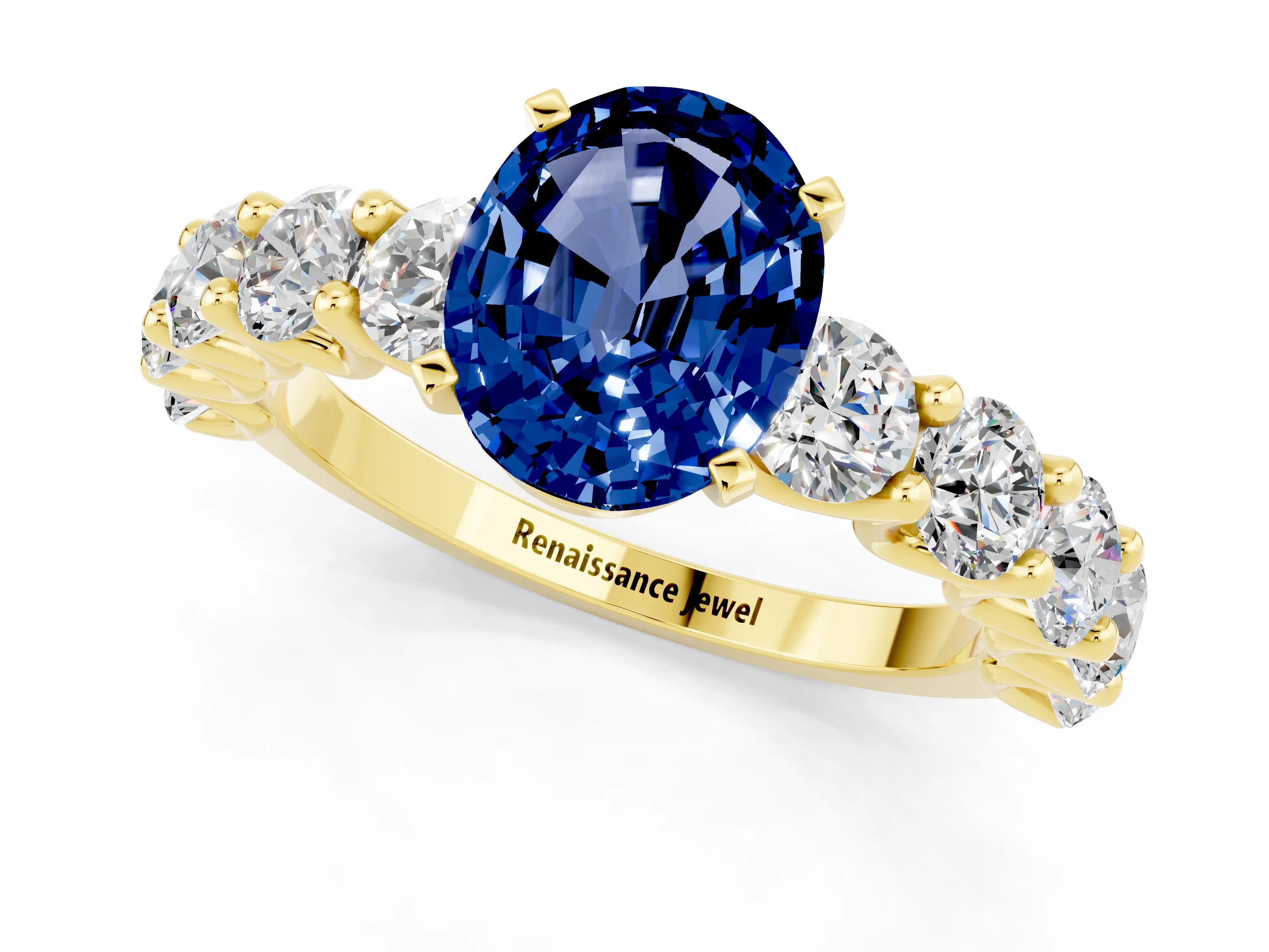 Yellow gold Oval Cut Blue Sapphire Prong Setting with Side Stones on a Pave Band_1
