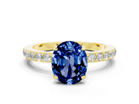 Yellow gold Oval Cut Blue Sapphire Ring with Pavé Band and Four-Prong Setting