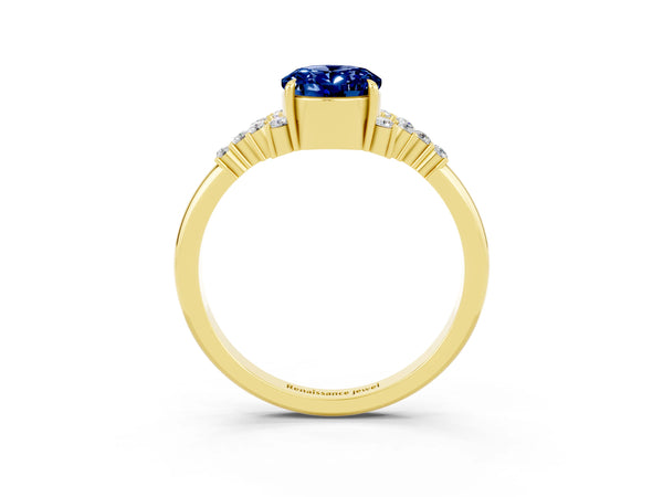 Yellow gold Oval Cut Blue Sapphire Ring with Side Stones and Four-Prong Setting