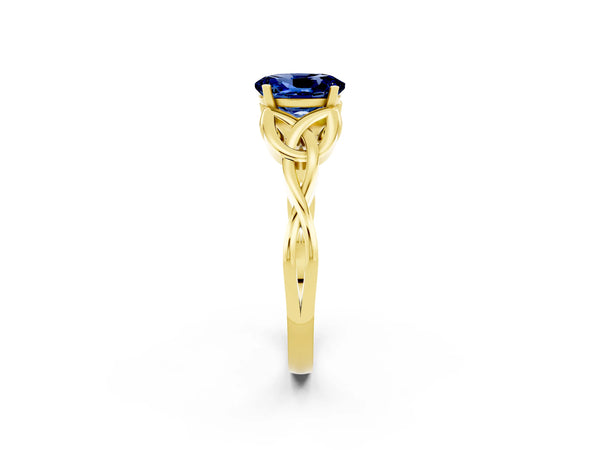 Yellow gold Oval Cut Blue Sapphire Solitaire Celtic Knot Ring with Four-Prong Setting