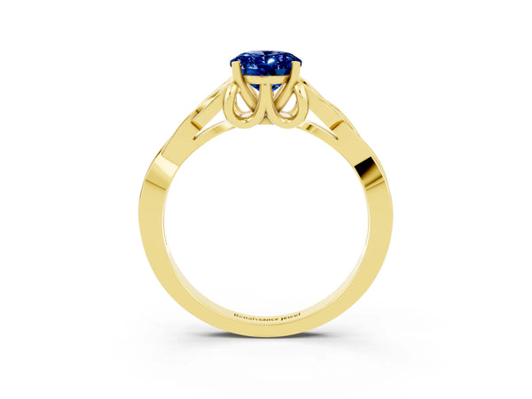 Yellow gold Oval Cut Blue Sapphire Solitaire Celtic Knot Ring with Four-Prong Setting