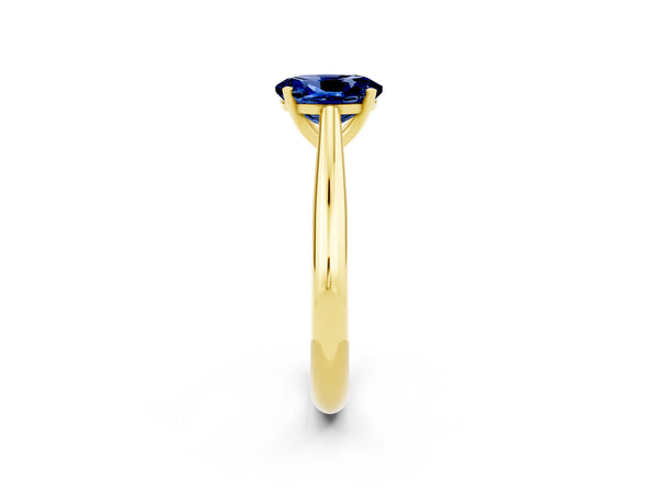 Yellow gold Oval Cut Blue Sapphire Solitaire Engagement Ring with Cathedral Setting and Four-Prong Mount