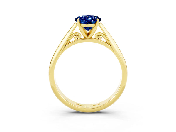 Yellow gold Oval Cut Blue Sapphire Solitaire Engagement Ring with Cathedral Setting and Four-Prong Mount