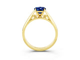 Yellow gold Oval Cut Blue Sapphire Solitaire Engagement Ring with Cathedral Setting and Four-Prong Mount_27