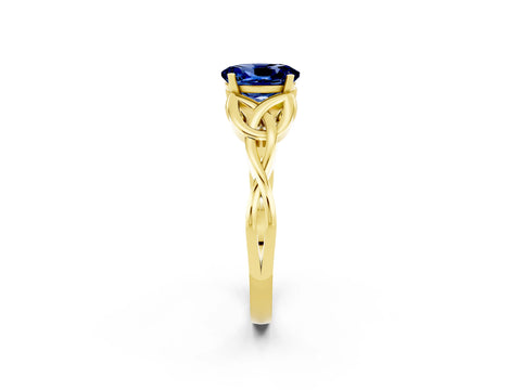 Yellow gold Oval Cut Blue Sapphire Solitaire Engagement Ring with Celtic Knot Band and Four-Prong Setting_2