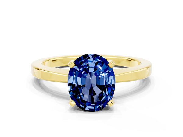 Yellow gold Oval Cut Blue Sapphire Solitaire Engagement Ring with Classic Band and Four-Prong Setting