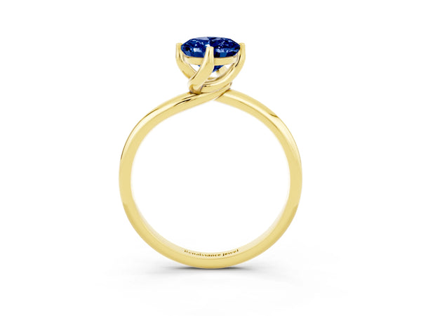 Yellow gold Oval Cut Blue Sapphire Solitaire Engagement Ring with Four-Prong Setting and Classic Band