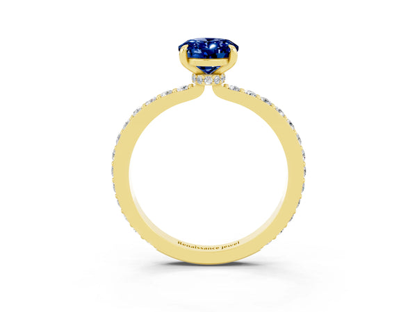 Yellow gold Oval Cut Blue Sapphire Solitaire Engagement Ring with Pavé Band and Four-Prong Setting