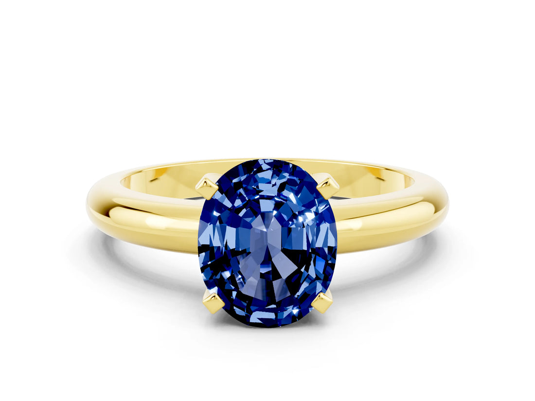 Yellow gold Oval Cut Blue Sapphire Solitaire Engagement Ring with Round Band and Four-Prong Setting