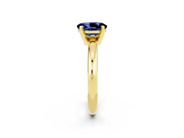 Yellow gold Oval Cut Blue Sapphire Solitaire Engagement Ring with Round Band and Four-Prong Setting