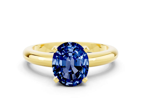 Yellow gold Oval Cut Blue Sapphire Solitaire Engagement Ring with Round Band and Four-Prong Setting