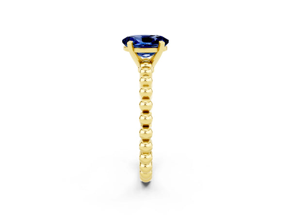 Yellow gold Oval Cut Blue Sapphire Solitaire Ring with Beaded Band and Prong Setting
