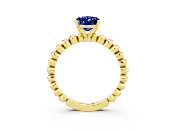 Yellow gold Oval Cut Blue Sapphire Solitaire Ring with Beaded Band and Prong Setting