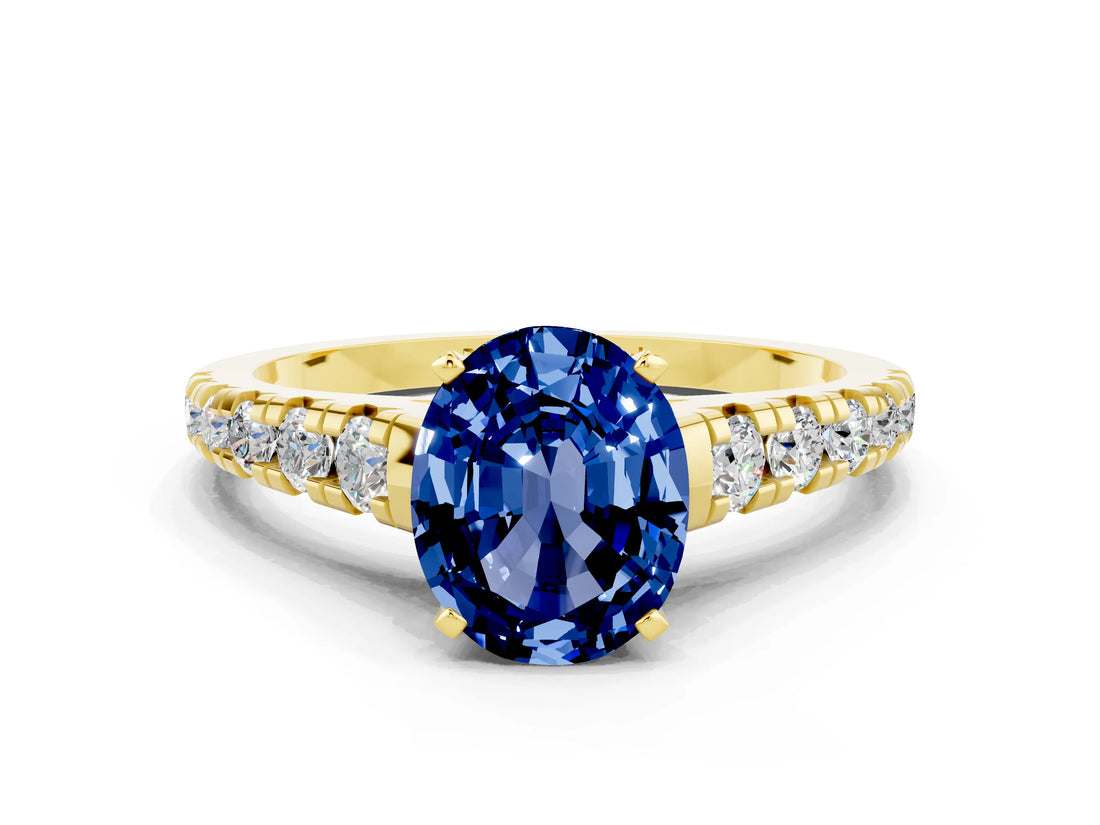 Yellow gold Oval Cut Blue Sapphire Solitaire Ring with Cathedral Setting and Pavé Band