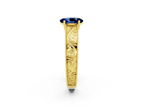 Yellow gold Oval Cut Blue Sapphire Solitaire Ring with Engraved Band and Four-Prong Setting_2