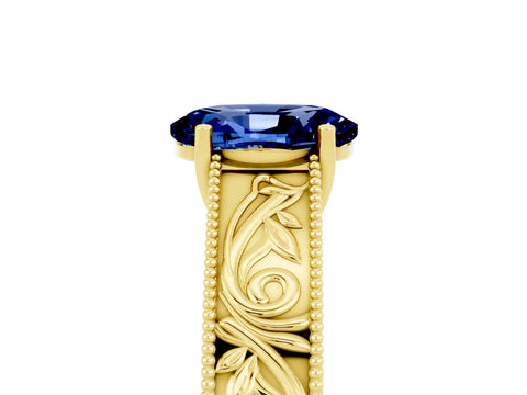 Yellow gold Oval Cut Blue Sapphire Solitaire Ring with Engraved Band and Four-Prong Setting_5