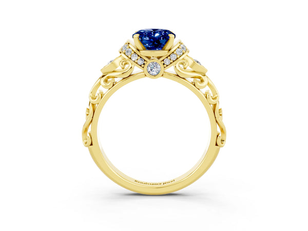 Yellow gold Oval Cut Blue Sapphire Solitaire Ring with Filigree Band and Four-Prong Setting