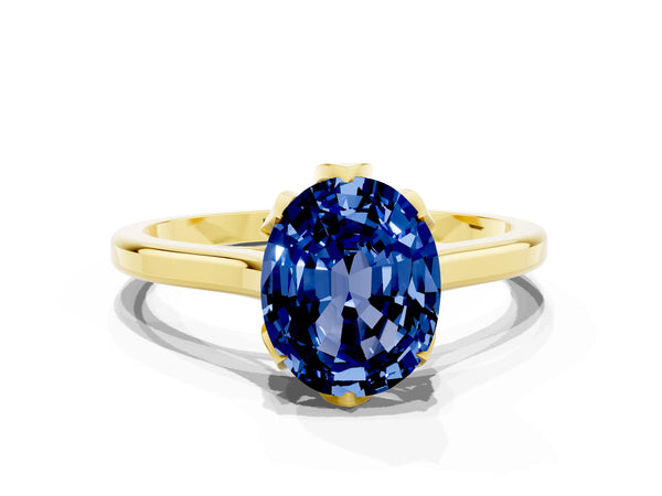 Yellow gold Oval Cut Blue Sapphire Solitaire Ring with Flower Prong Setting and Classic Band
