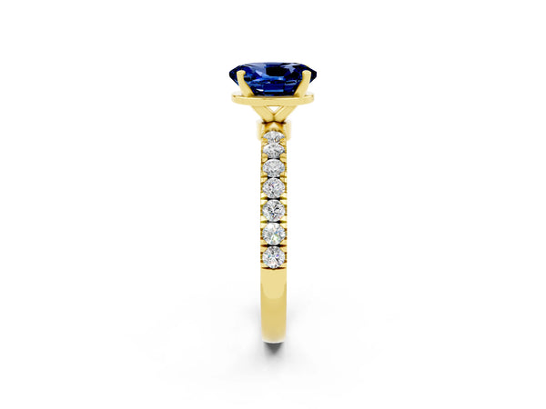 Yellow gold Oval Cut Blue Sapphire Solitaire Ring with Pavé Accents and Four-Prong Setting