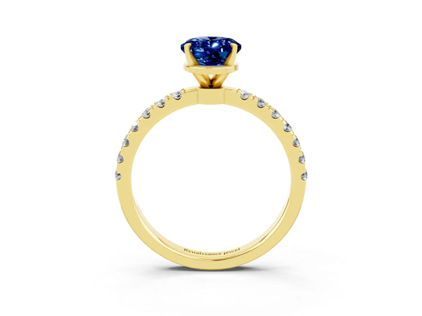 Yellow gold Oval Cut Blue Sapphire Solitaire Ring with Pavé Accents and Four-Prong Setting