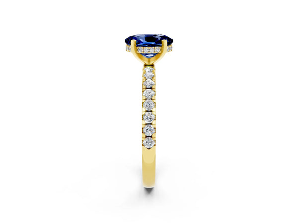 Yellow gold Oval Cut Blue Sapphire Solitaire Ring with Round Pavé Band and Four-Prong Setting