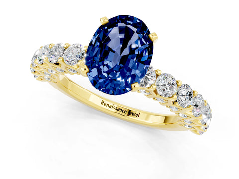 Yellow gold Oval Cut Blue Sapphire Solitaire Ring with Shared Prong Pavé Band and Four-Prong Setting_1