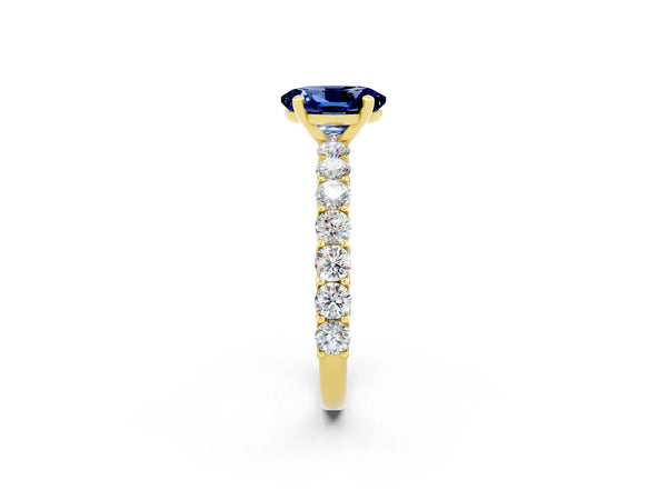 Yellow gold Oval Cut Blue Sapphire Solitaire Ring with Shared Prong Pavé Band and Four-Prong Setting