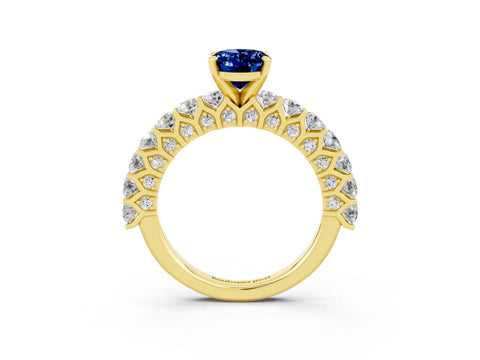 Yellow gold Oval Cut Blue Sapphire Solitaire Ring with Shared Prong Pavé Band and Four-Prong Setting_3