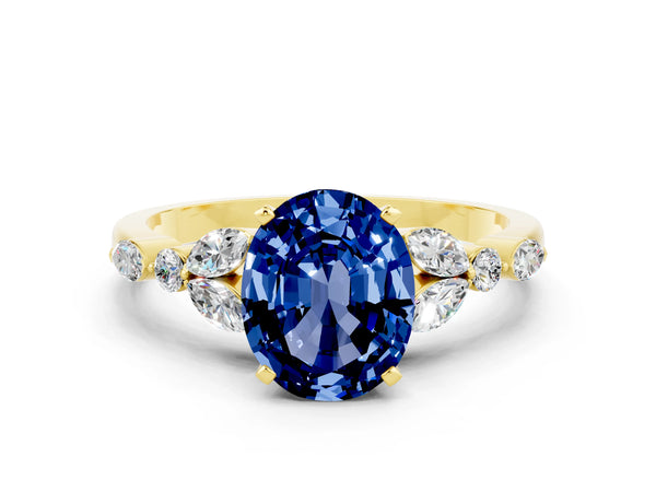 Yellow gold Oval Cut Blue Sapphire Solitaire Ring with Side Stones and Four-Prong Setting